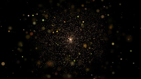 Bokeh-shining-colorful-particles-explode.-Shimmering-Glittering-Particles-loop-animation-with-black-background